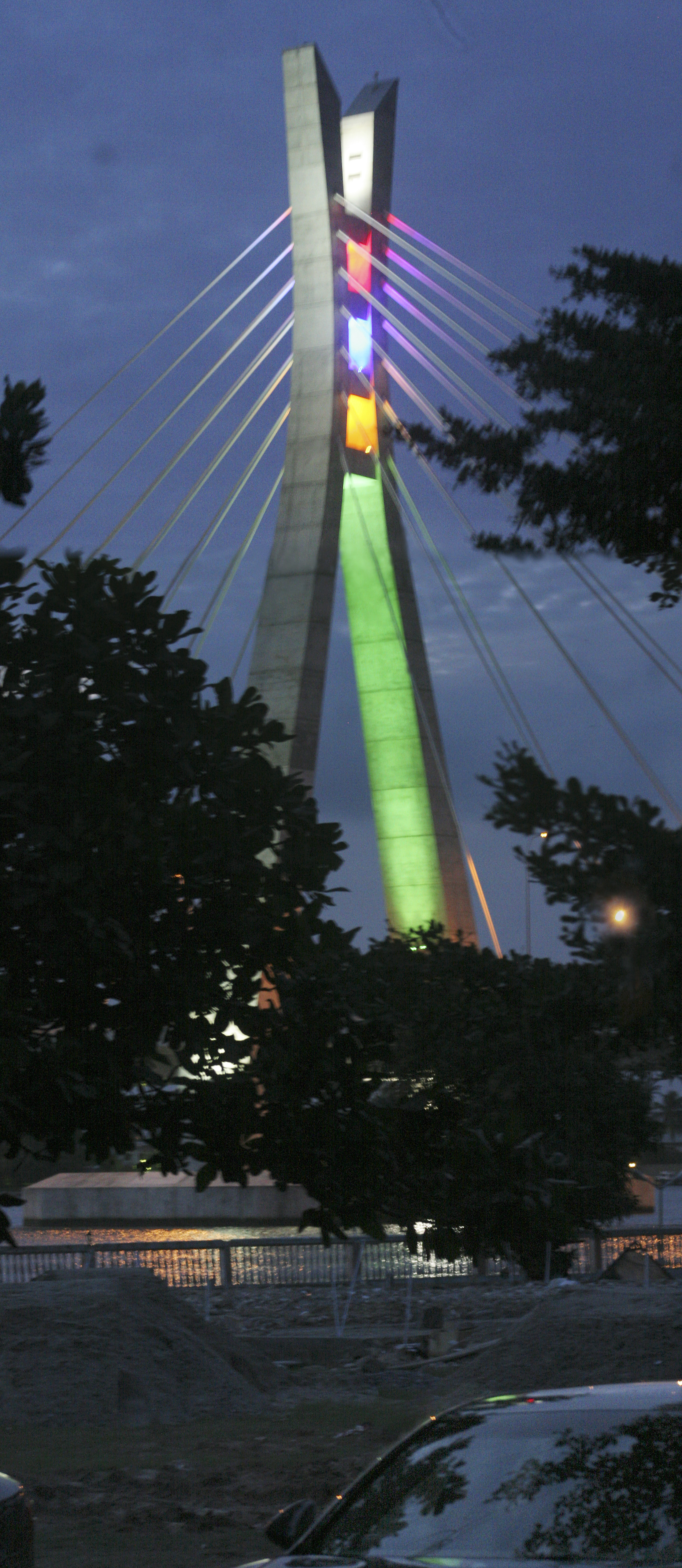 Night-time view of completed bridge pylon and running cables beautifully lit up (muyiwa osifuye)