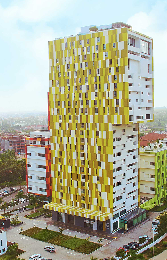 Side view of completed 30 storey Alto Tower with Yellow Kente-patterned facade (trasaccogroup.com)