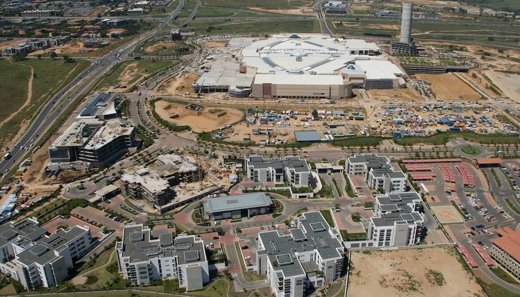 Aerial view of site showing back of mall and apartments in surrounding area (sapeople.com)
