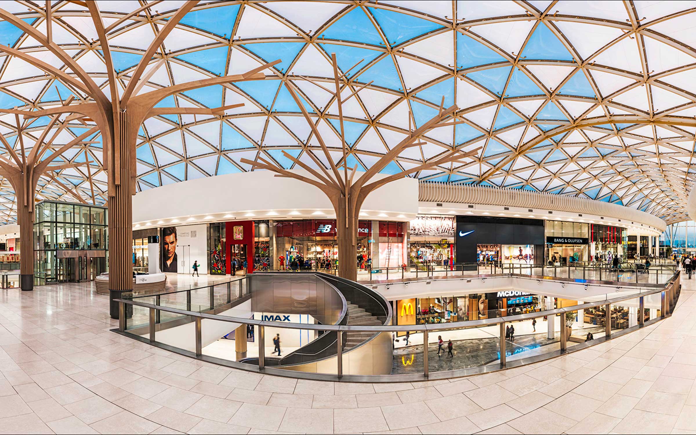 Mall interior showing roof cladding panels and roof support structures (novumstructures.com)
