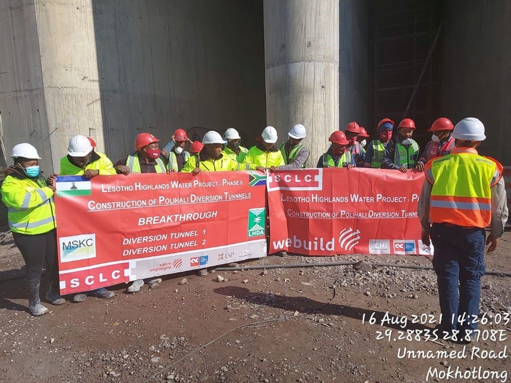 Construction workers celebrating the breakthrough of the Polihali diversion tunnels, Lesotho
