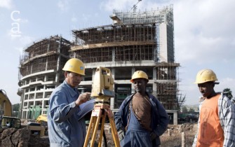 Chinese and Ethiopian workers undertaking site survey during construction (stratfor.com)